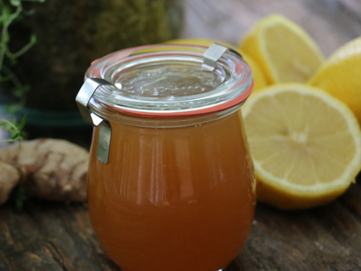 Healing homemade anti cough syrup with lemon honey and vinegar